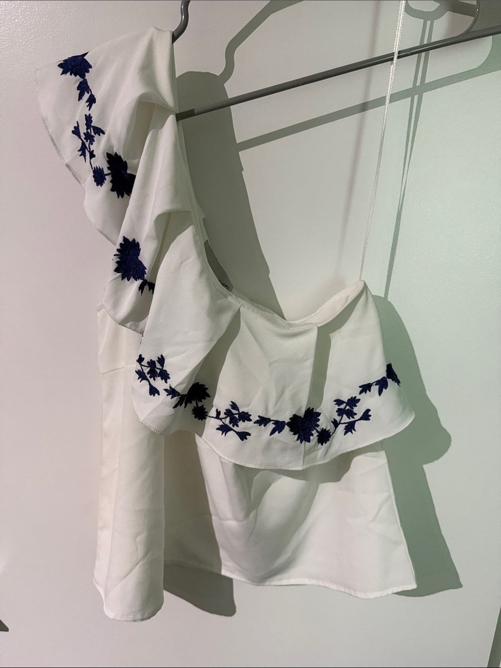 White One-Shoulder Ruffle Camisole with Navy Floral Embroidery